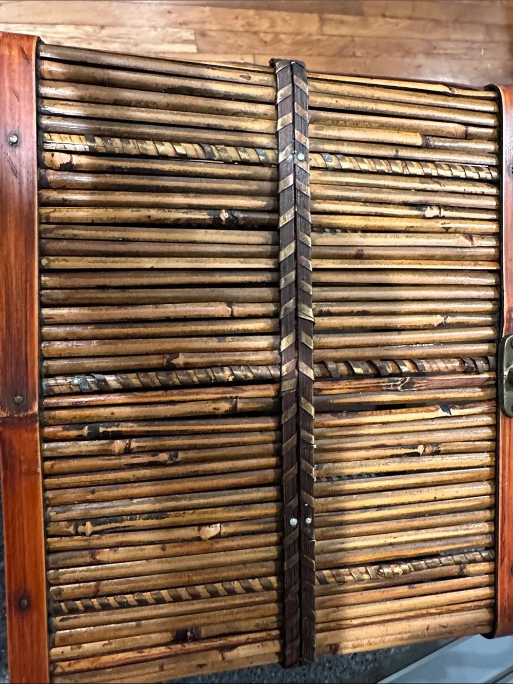 Woven bamboo storage box. All bamboo with metal latch closure.